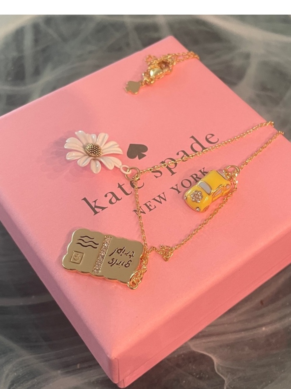 kate spade Gold Necklace with Yellow Taxi, White Daisy & Gold Book Charms